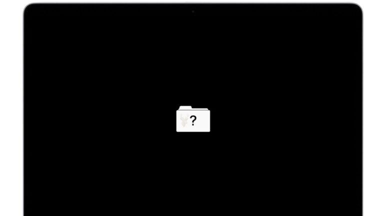 MacBook Pro displaying a flashing folder with a question mark, indicating that the startup disk cannot be found.
