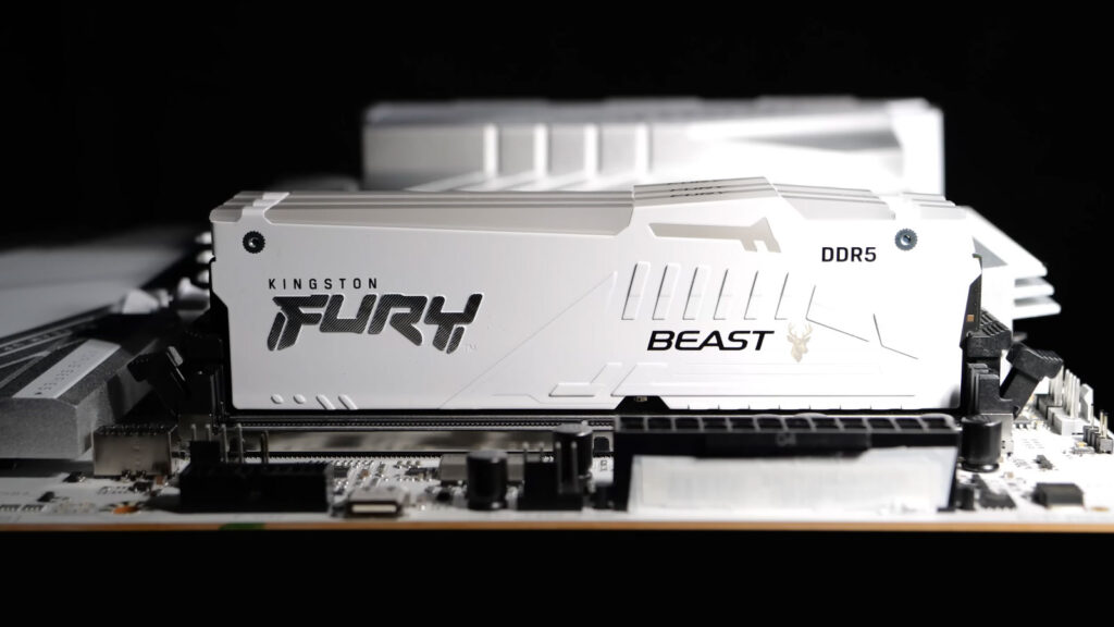 DDR5 memory module being installed into a computer motherboard.