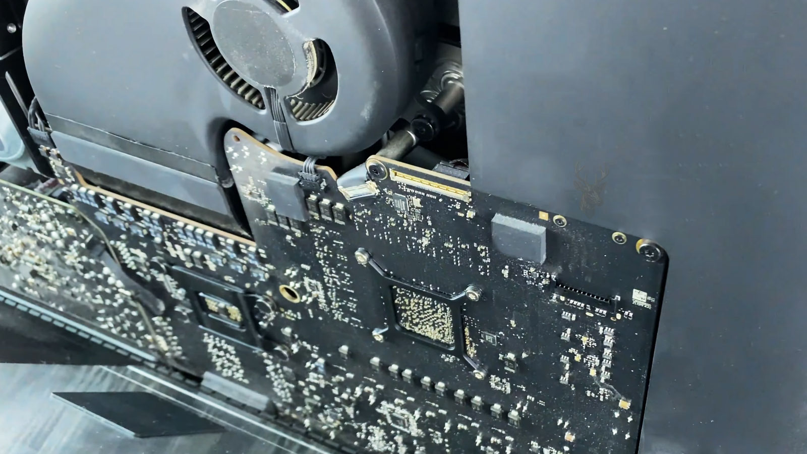 iMac opened with display lifted during internal hardware inspection