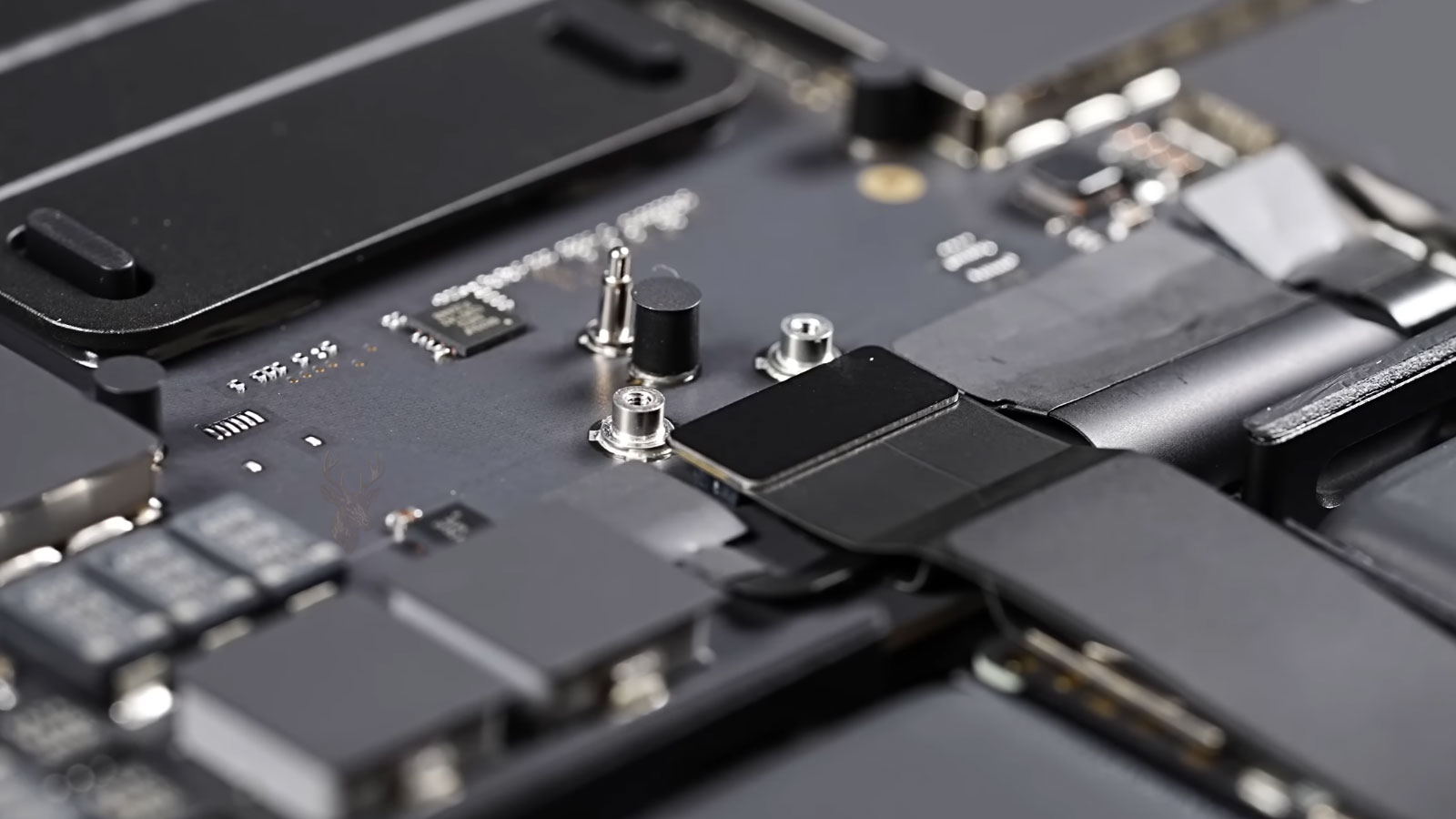 MacBook Pro internal connector being disconnected during hardware inspection