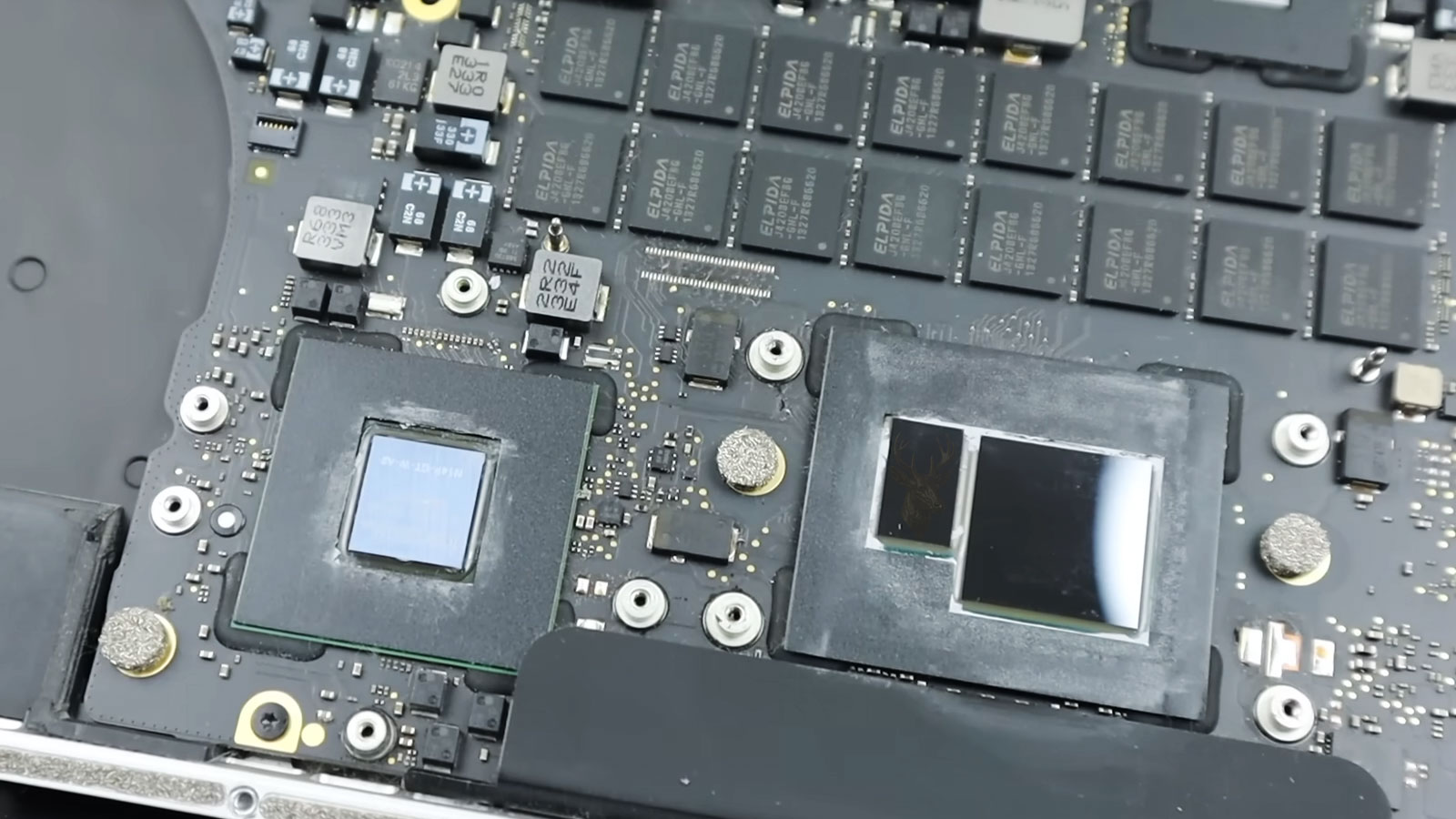 MacBook Pro logic board exposed during internal hardware inspection