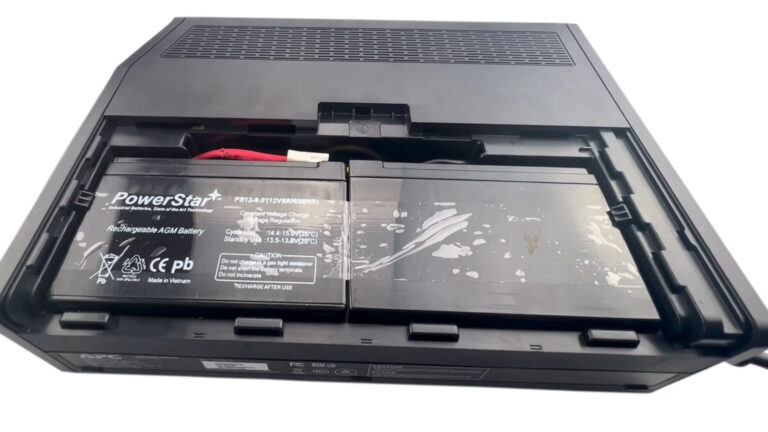 APC UPS receiving a replacement battery to restore backup runtime.