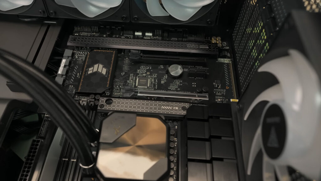 Desktop motherboard with a visible CMOS battery beside the CPU and water-cooling pump, representing BIOS time problems after shutdown.