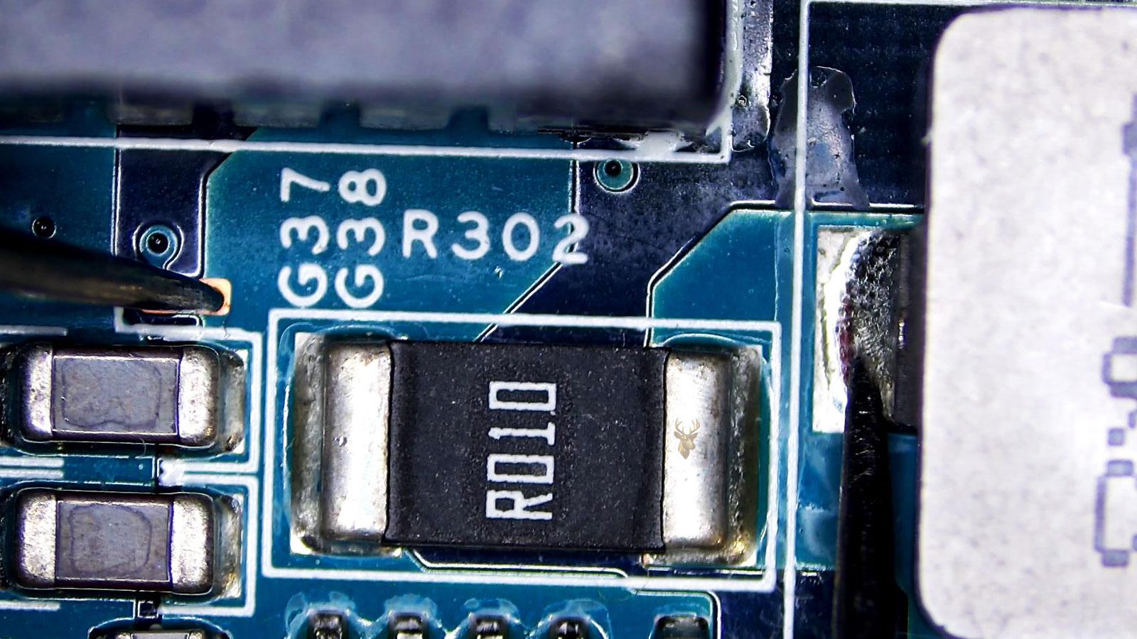 Measurement from one side of the coil to the pad where the R010 resistor connects.