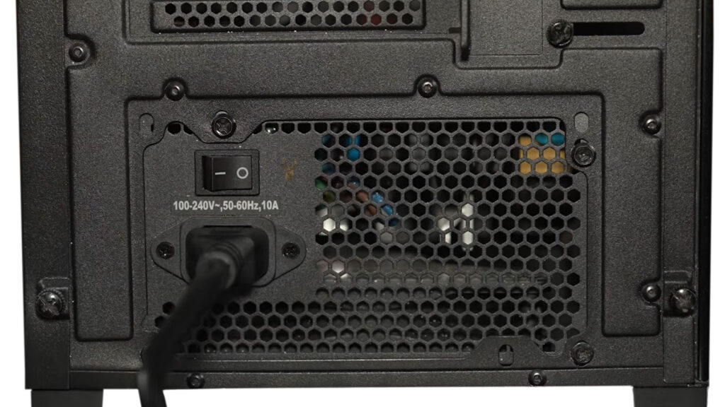 Rear of a desktop computer showing the power supply cable and on-off switch during troubleshooting of an intermittent startup problem.
