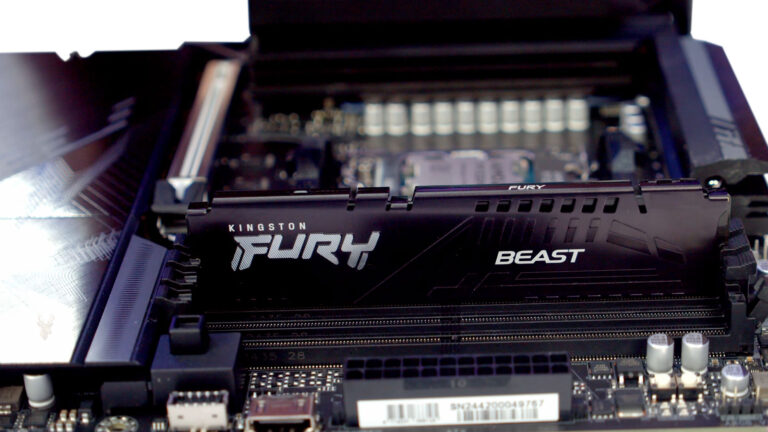 Memory module installed in a motherboard during reassembly while troubleshooting intermittent memory errors.
