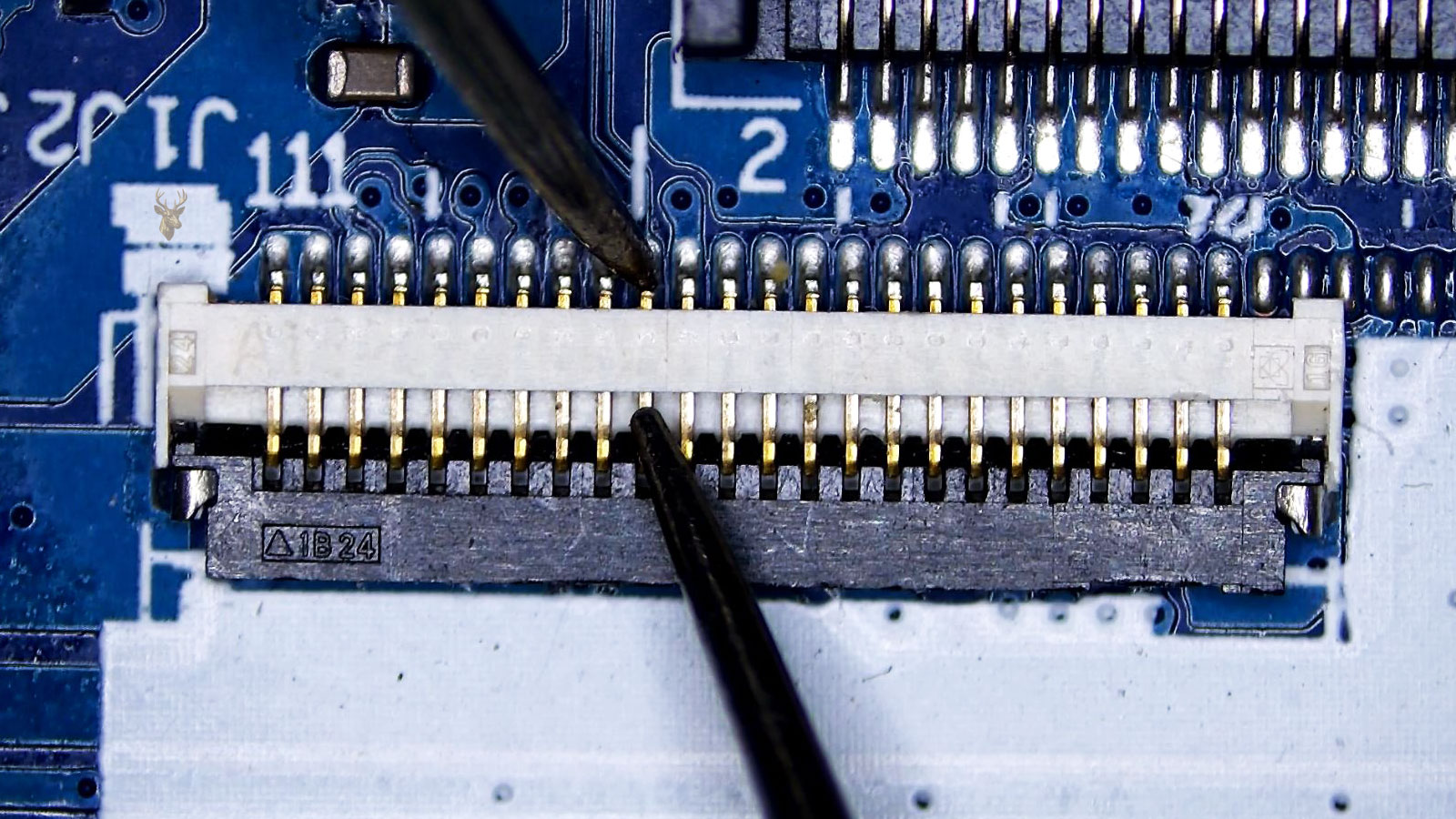 J1 24-pin flex connector being measured from a rear soldered pin to the front locking side of the same pin.