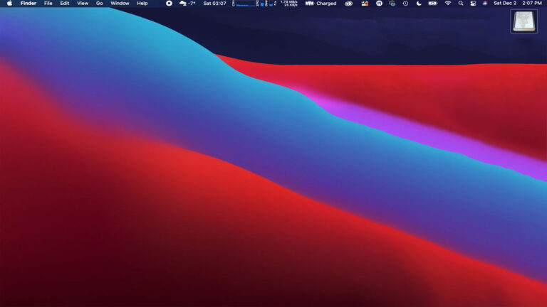 Silver MacBook Pro with an external drive icon on the desktop that refuses to eject.