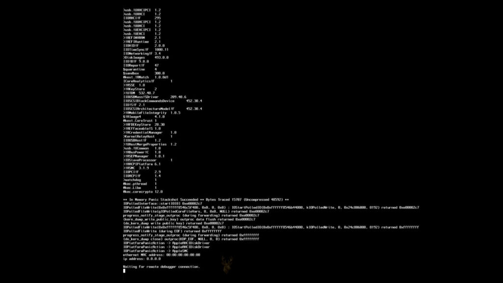 Black Mac terminal screen displaying kernel panic code before an unexpected system crash and restart.