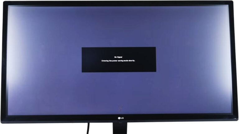 LG monitor displaying a “No Signal” message and entering power-saving mode because no active video input is detected.
