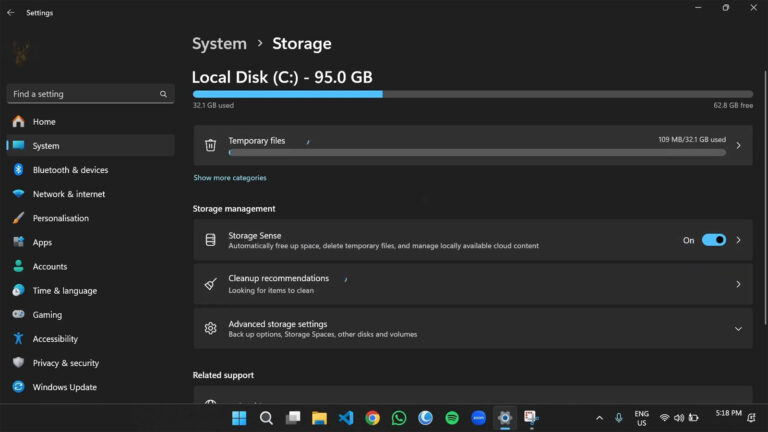 Windows Storage settings showing Storage Sense enabled to automatically reclaim disk space.