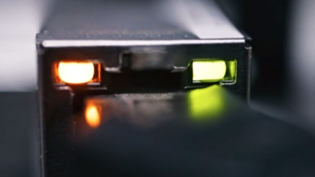 Ethernet LAN port with green and orange LEDs illuminated for Wake-on-LAN functionality.