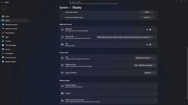 Windows Display settings showing Scale and Layout options for display scaling, screen resolution, and display orientation.