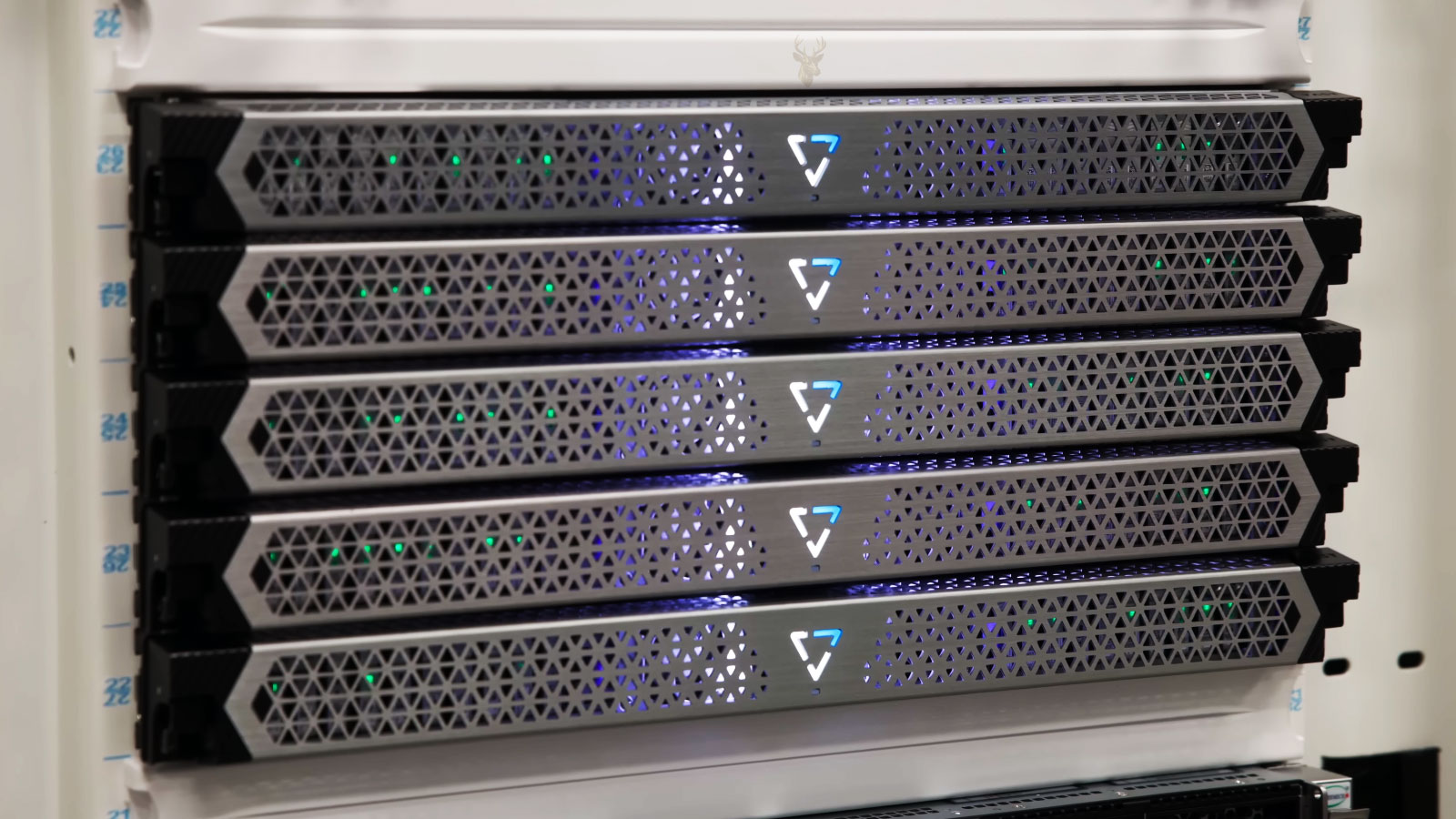 Four professional business workstations installed together in a server rack.