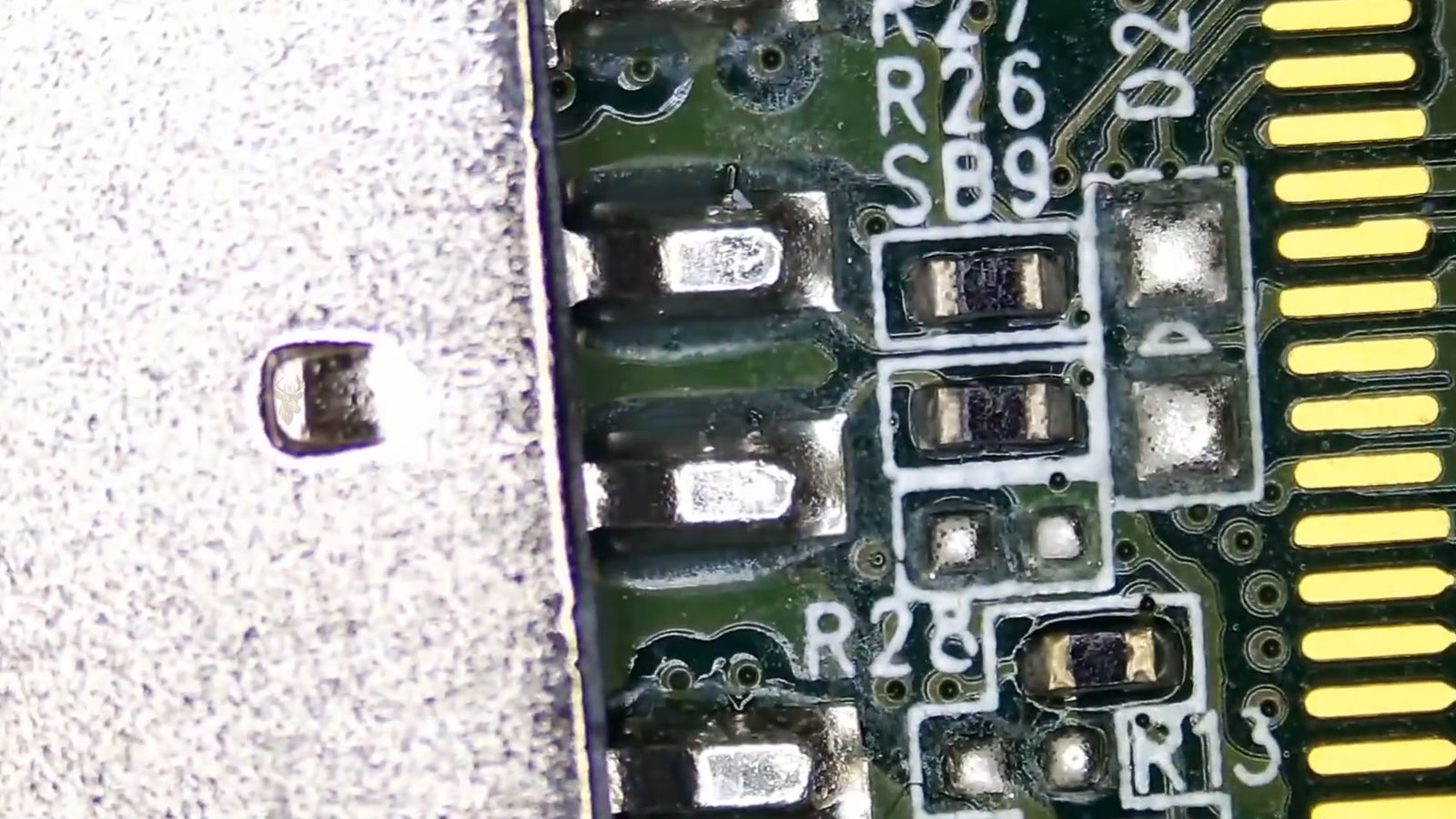 USB flash drive circuit board exposed during a professional data recovery procedure.