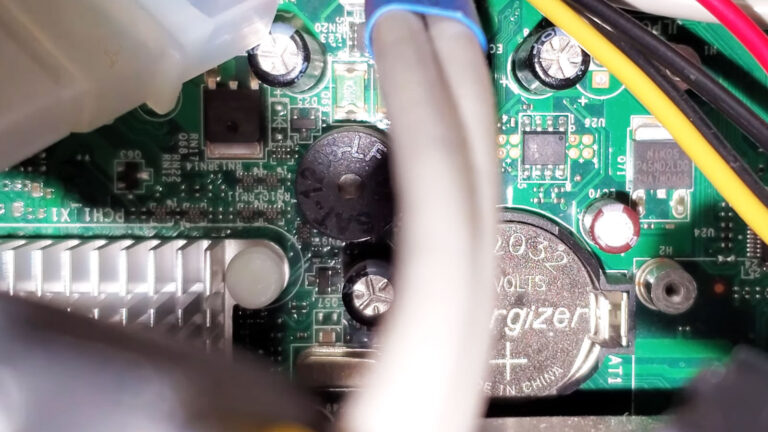 Desktop motherboard with the internal PC speaker installed for POST beep codes and startup warning sounds.