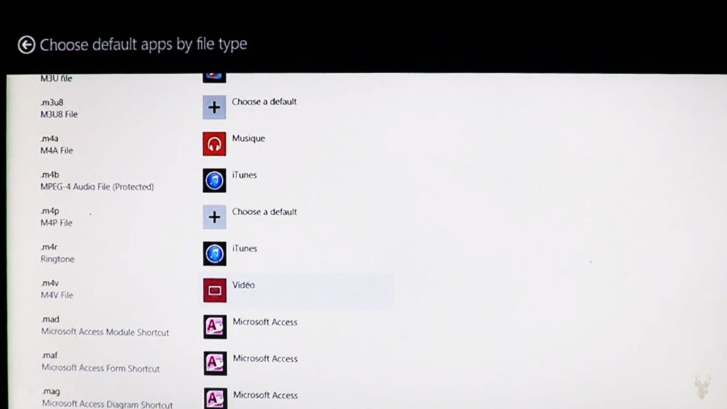 Windows 8.1 Choose default apps by file type settings showing file extensions and their assigned default programs.