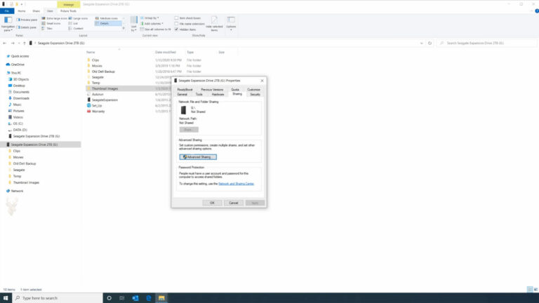 Windows folder Properties opened to the Sharing tab with Advanced Sharing ready to configure a folder on an external drive.