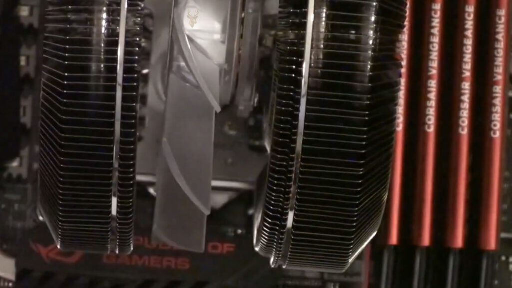 Desktop CPU cooler with a large cooling fan and heatsink illustrating components that can become noisy as they age.