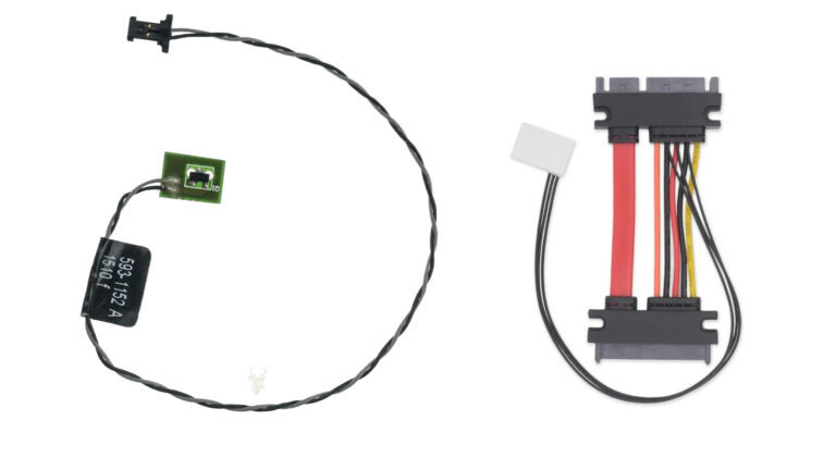 Original iMac temperature sensor connector beside a SATA adapter with an integrated temperature sensor for replacement drives.